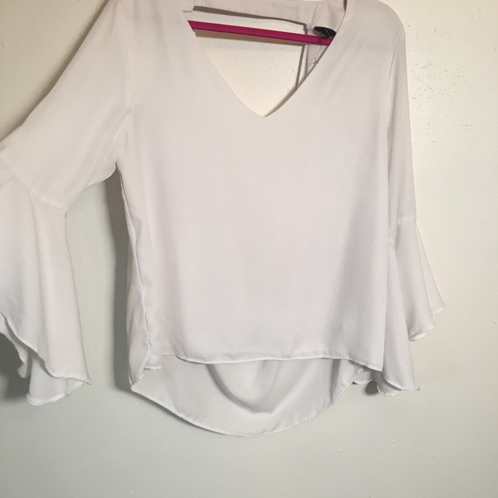 Open back white blouse